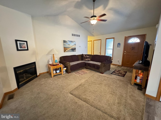 living room with lofted ceiling, carpet floors, and ceiling fan