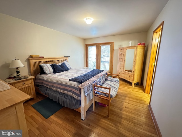 bedroom with light wood-type flooring