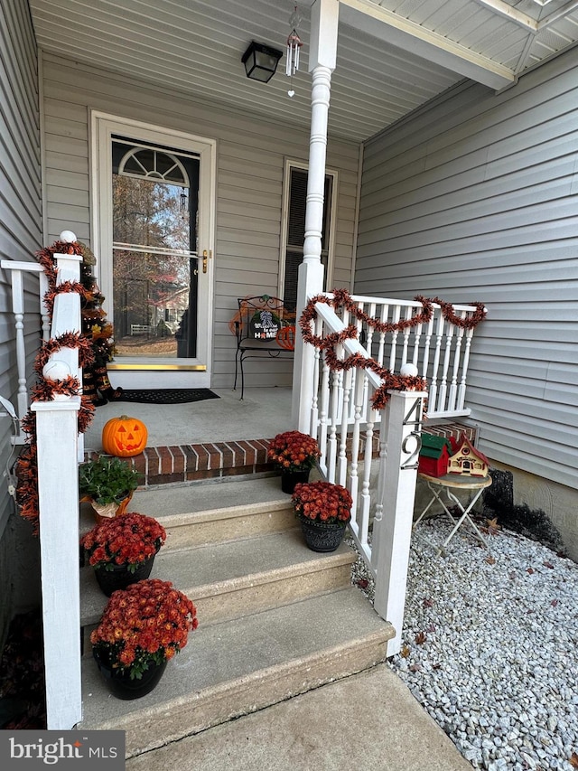 property entrance with a porch