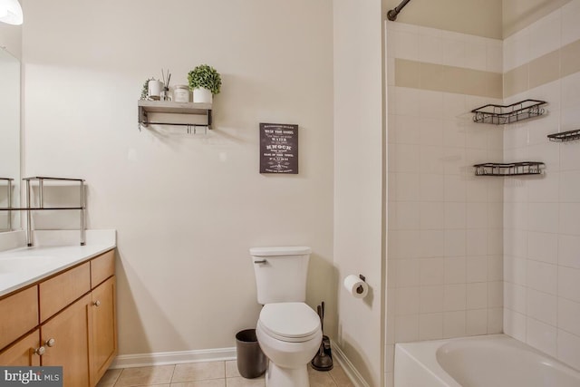 full bathroom featuring vanity, toilet, tile patterned flooring, and tiled shower / bath