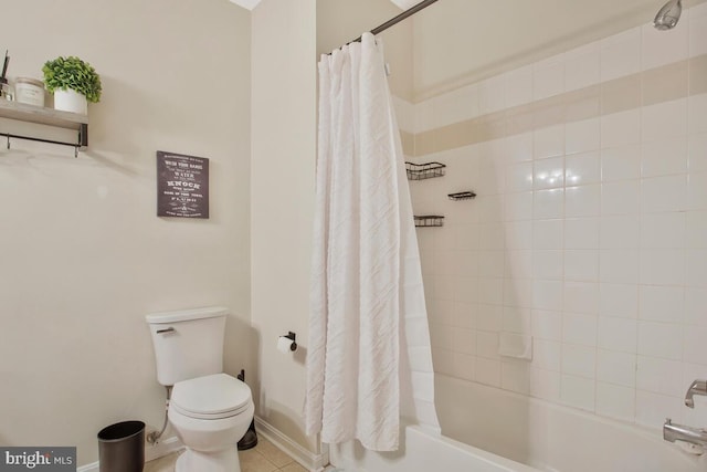 bathroom featuring toilet, tile patterned floors, and shower / bathtub combination with curtain