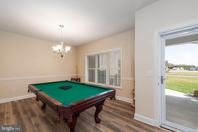 recreation room with an inviting chandelier, pool table, and dark hardwood / wood-style floors