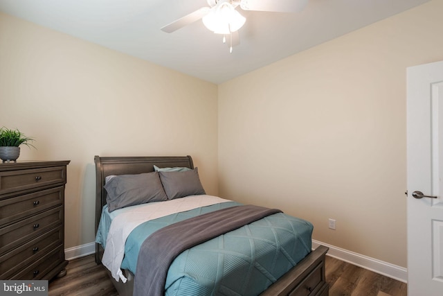 bedroom featuring dark hardwood / wood-style floors and ceiling fan