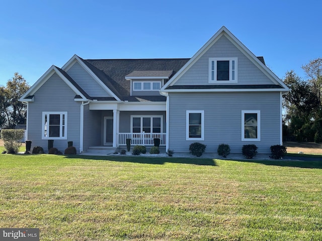 back of house with a yard