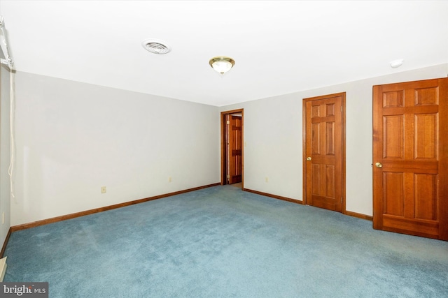 unfurnished bedroom featuring light colored carpet