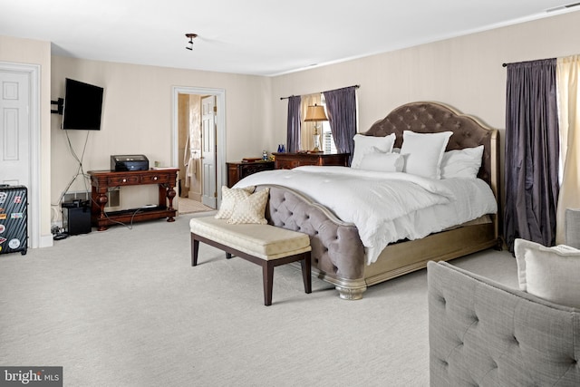 bedroom featuring carpet flooring and visible vents