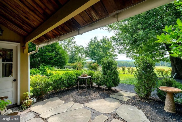 view of patio / terrace featuring fence