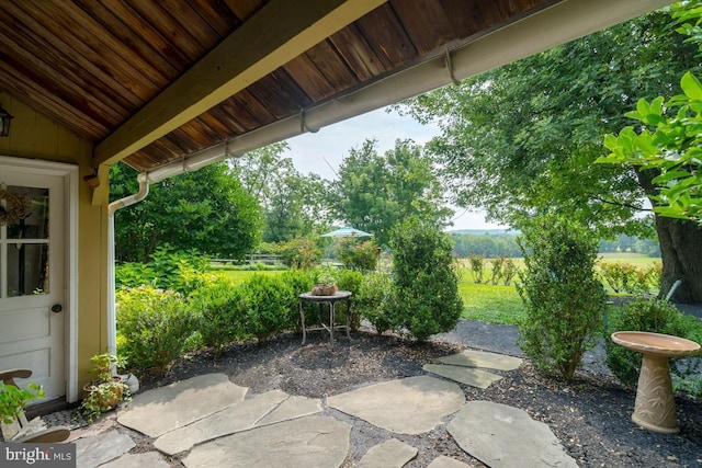 view of patio featuring fence