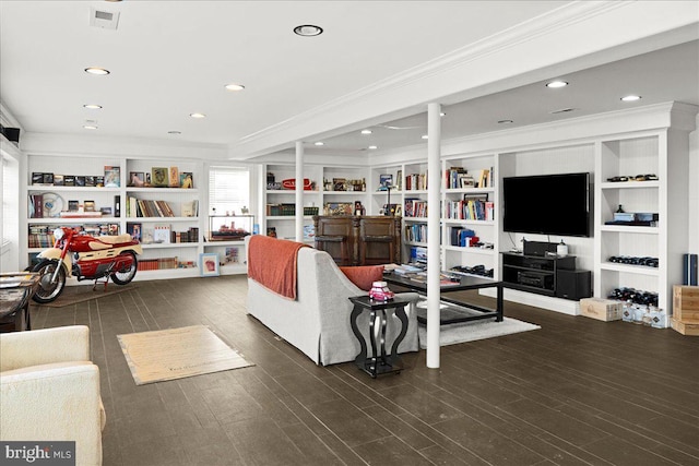 living area featuring visible vents, ornamental molding, dark wood-style flooring, and recessed lighting