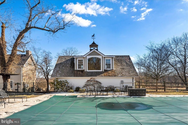 view of swimming pool featuring a fenced in pool, a patio area, and fence