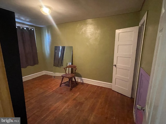 interior space with dark hardwood / wood-style flooring