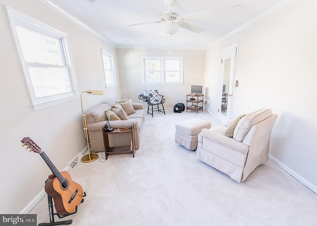 living room with light carpet, ceiling fan, and crown molding