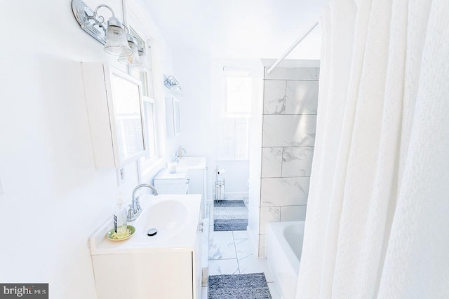 bathroom with tile patterned floors, vanity, and shower / bathtub combination