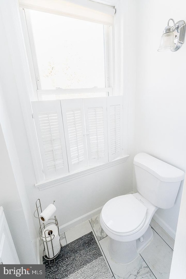 bathroom featuring toilet