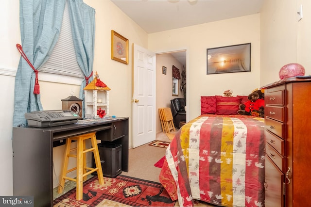 bedroom featuring carpet flooring