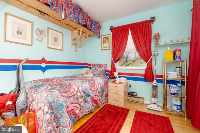 bedroom featuring wood-type flooring