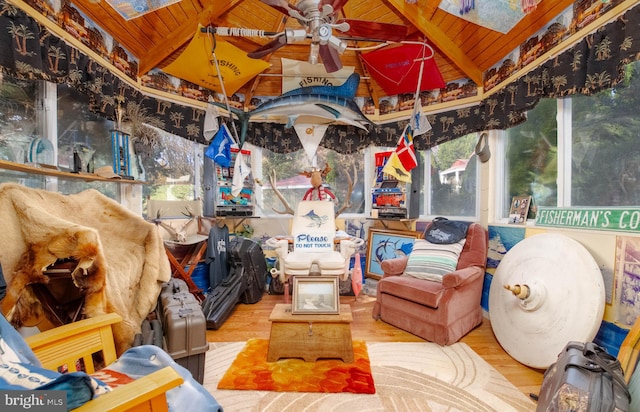 miscellaneous room with hardwood / wood-style floors, vaulted ceiling with beams, ceiling fan, and wood ceiling