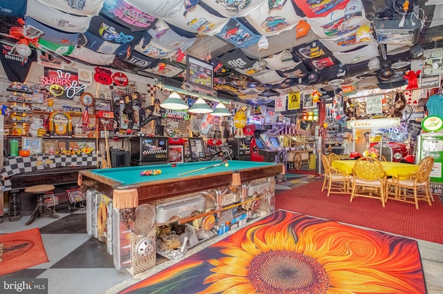 playroom with concrete flooring and pool table