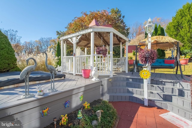 wooden terrace with a gazebo