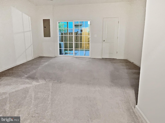 unfurnished room with carpet flooring