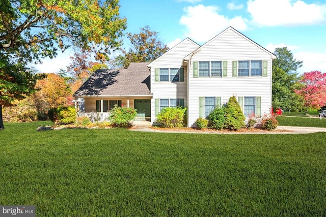 view of front of home with a front lawn