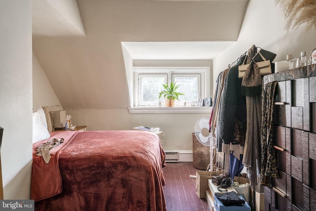 bedroom featuring dark wood-type flooring and vaulted ceiling