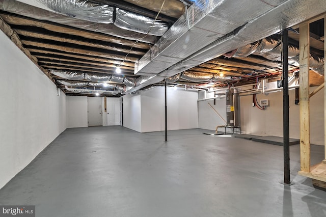 basement featuring gas water heater