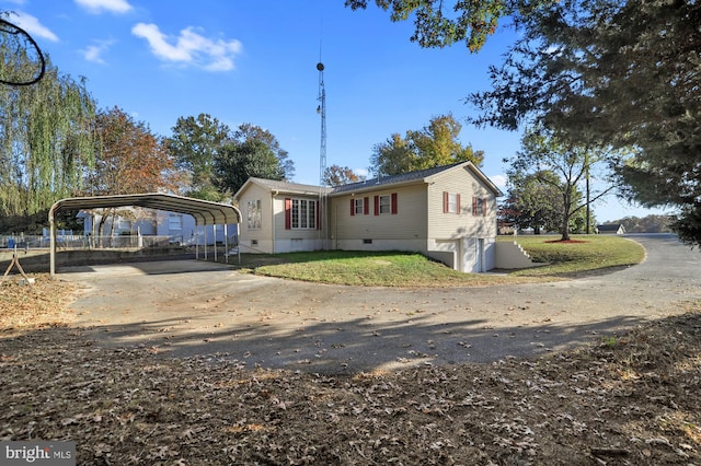 view of front of house featuring a carport