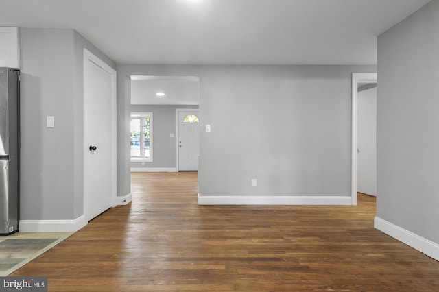 unfurnished room featuring hardwood / wood-style floors