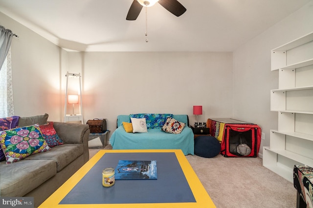 living room with light carpet and ceiling fan