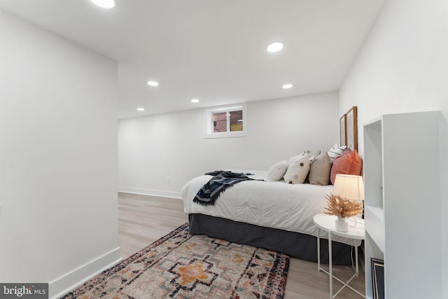 bedroom with light wood-type flooring