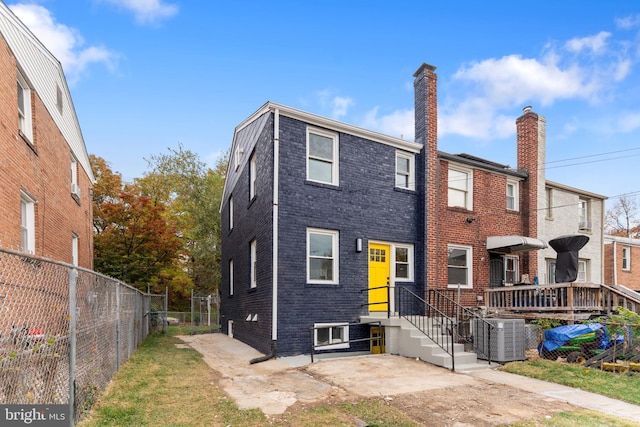 view of front of house featuring central AC