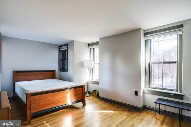 bedroom featuring light hardwood / wood-style flooring