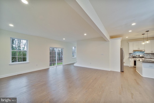 unfurnished living room featuring light hardwood / wood-style floors