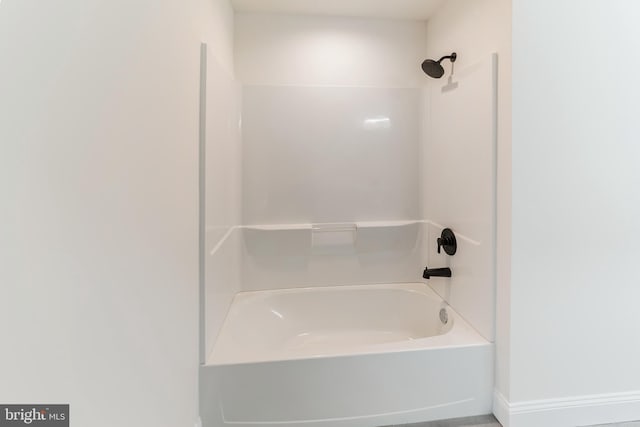 bathroom with bathing tub / shower combination