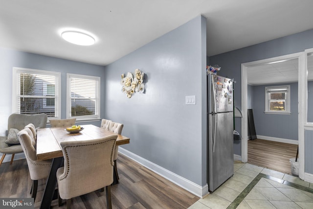 dining area featuring light tile patterned floors