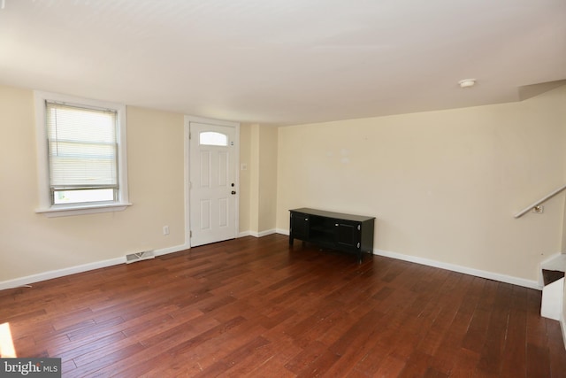 entrance foyer with dark hardwood / wood-style flooring