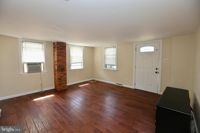 entrance foyer featuring cooling unit and dark hardwood / wood-style floors