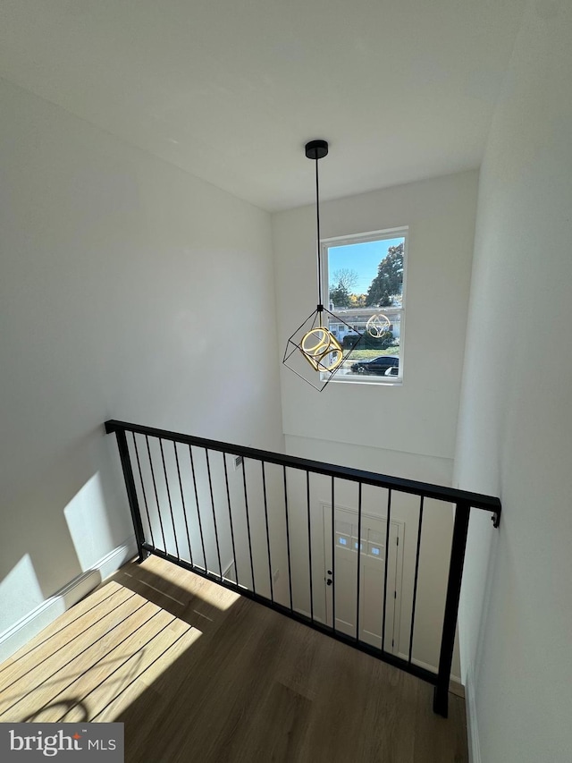 stairway with wood-type flooring