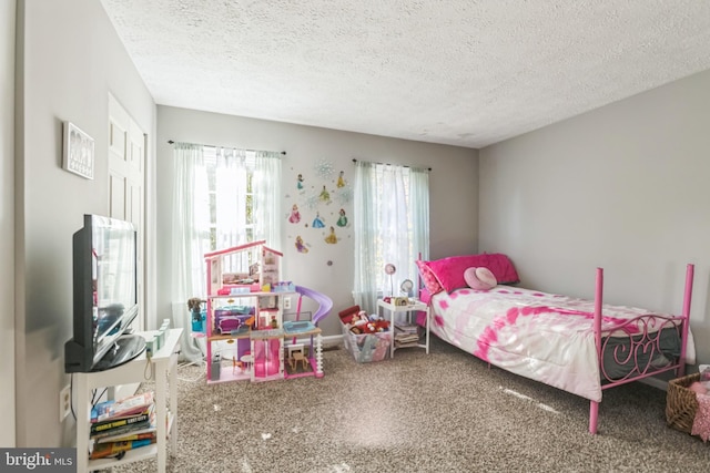 bedroom with a textured ceiling