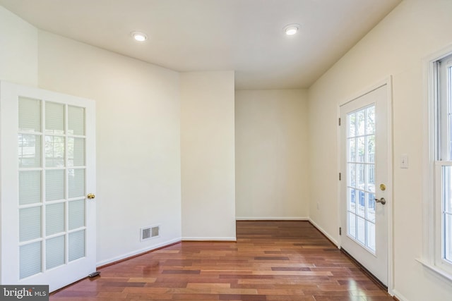 interior space with hardwood / wood-style flooring