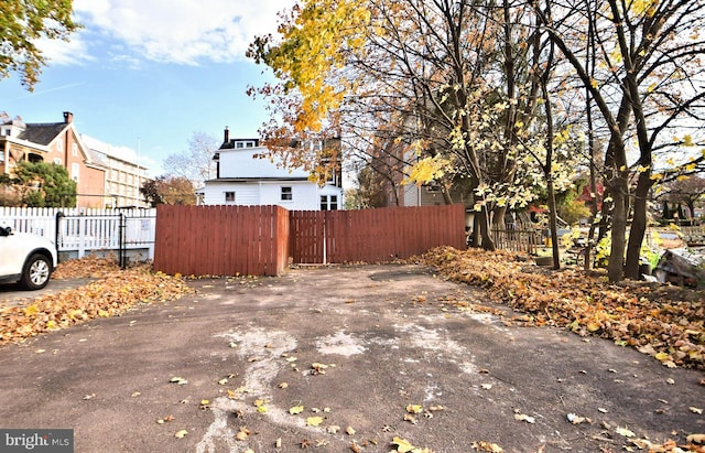 view of side of property with fence