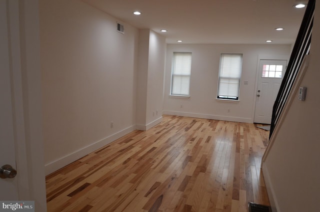 foyer with light hardwood / wood-style flooring