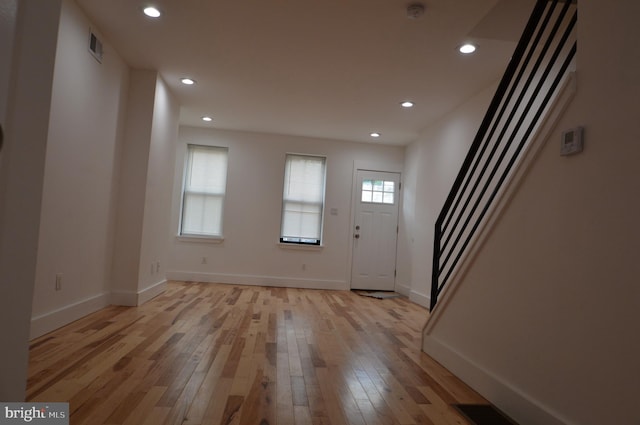 foyer with light wood-type flooring