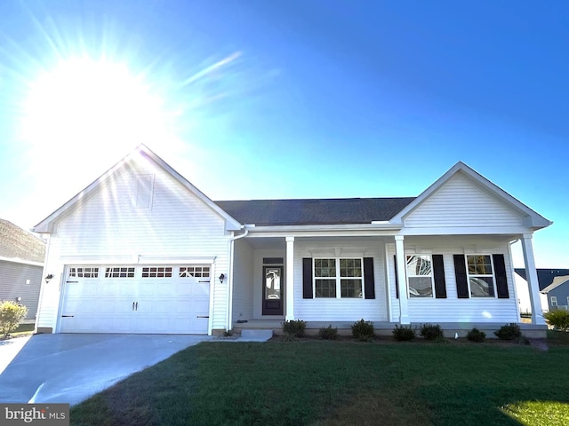 ranch-style home with a front yard and a garage