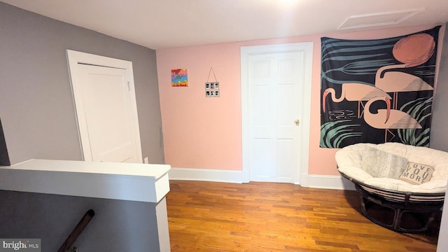 living area with light hardwood / wood-style floors