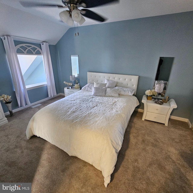 carpeted bedroom with ceiling fan and lofted ceiling