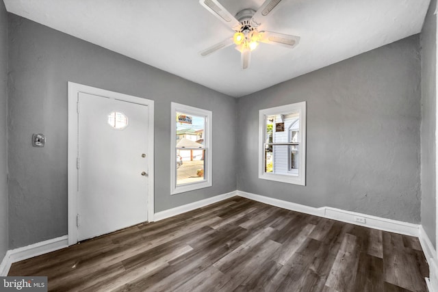 entrance foyer featuring dark wood-type flooring and ceiling fan