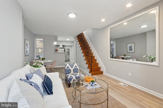 living room featuring wood-type flooring