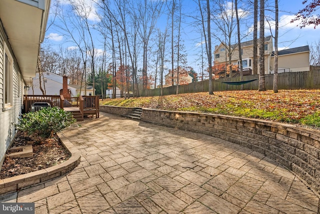 view of patio / terrace featuring a wooden deck